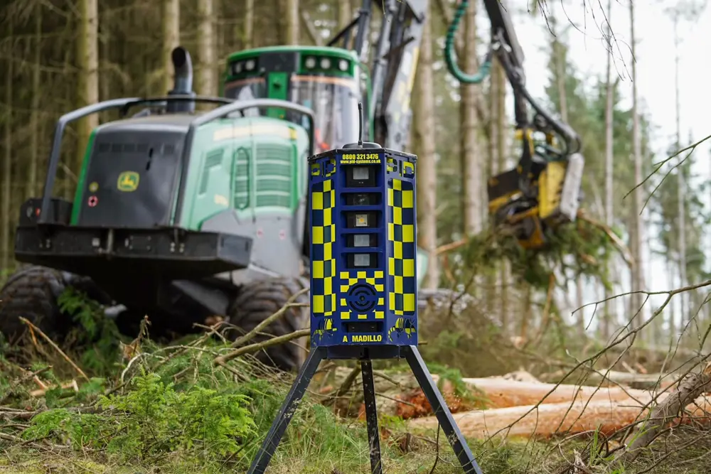 A security camera next to a harvester
